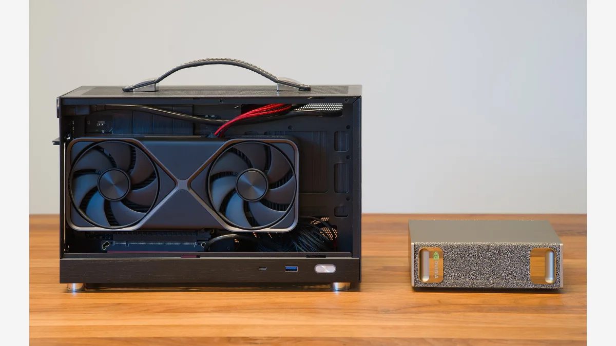An NVIDIA DGX Spark beside a small-form-factor PC with a GeForce RTX 5070 — the desktop AI appliance Nvidia is now selling in a halved-memory 64GB configuration.