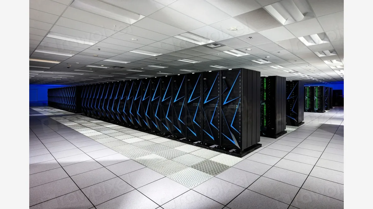 A datacenter server hall of the kind that houses rack-scale systems such as NVIDIA's GB300 and Vera Rubin NVL72, which submitted results to MLPerf Inference v6.1.