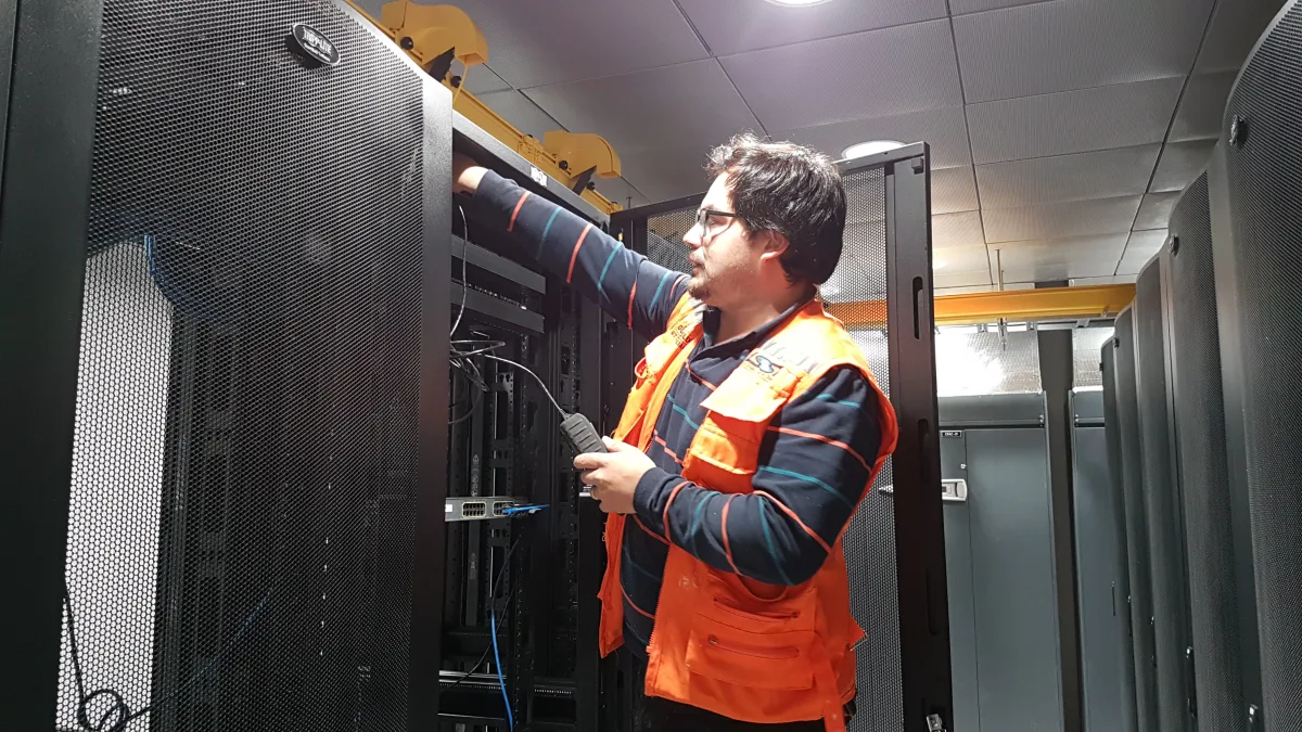 Server racks during a computer room installation; Oracle's Project Jupiter campus in New Mexico is designed to draw 2.45 gigawatts