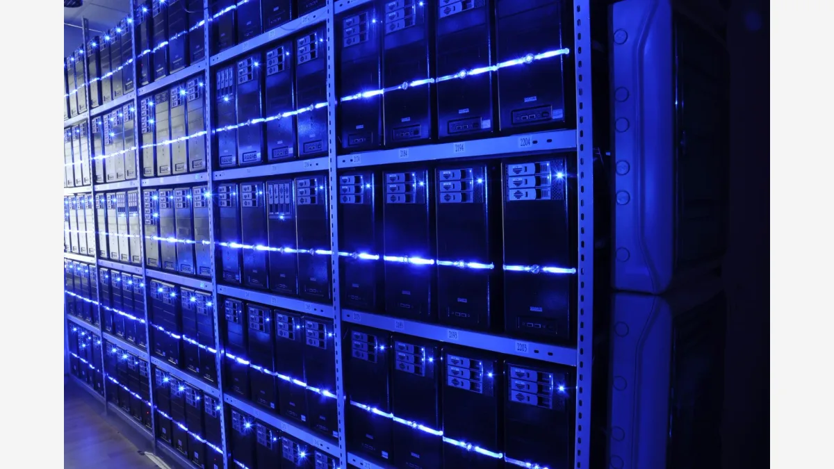 Server racks in a commercial data center, the kind of hosted infrastructure Docker's new Cloud Sandboxes use to run AI agent workloads away from developer laptops.