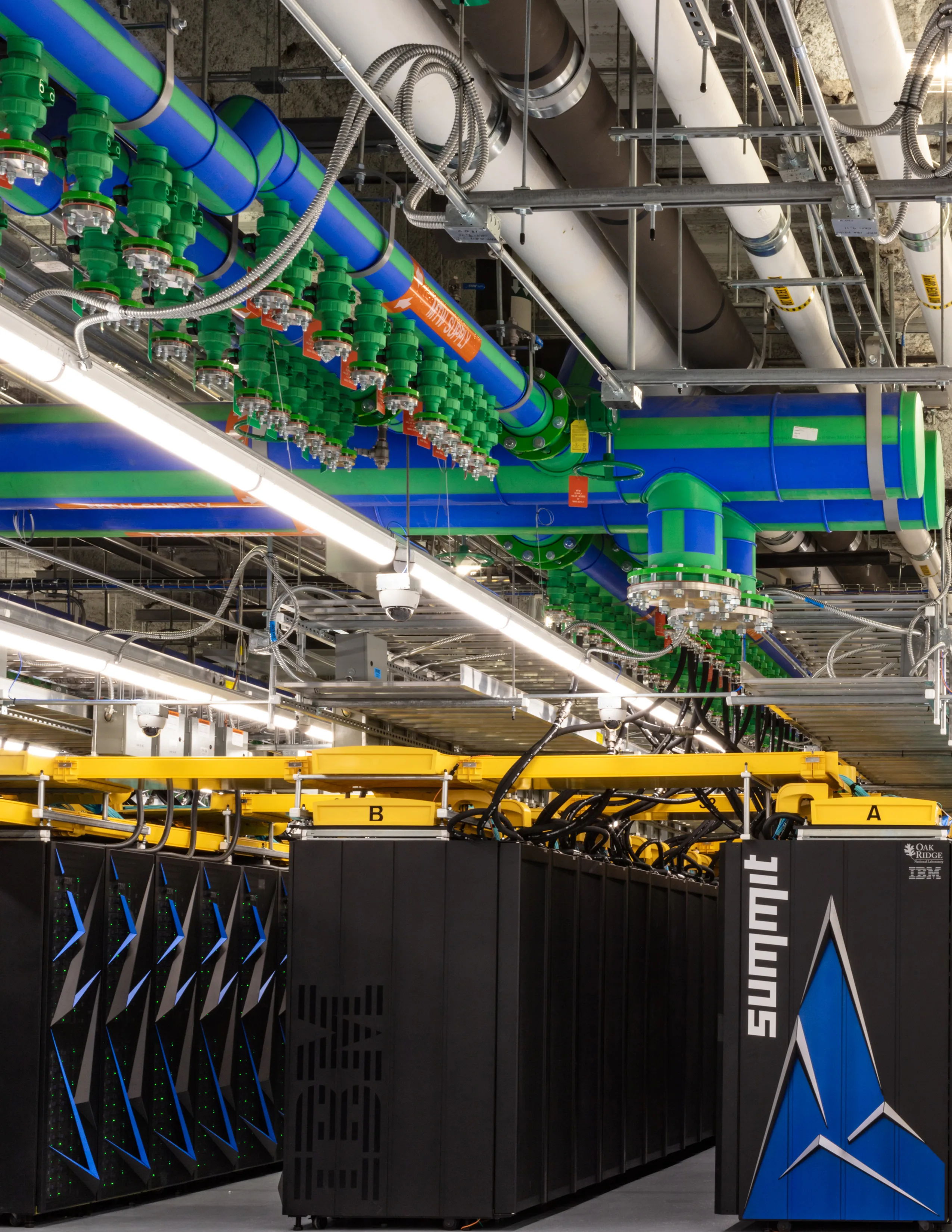 A large-scale supercomputing floor of the type used to train frontier models, whose training runs produced several of the six incidents OpenAI disclosed.