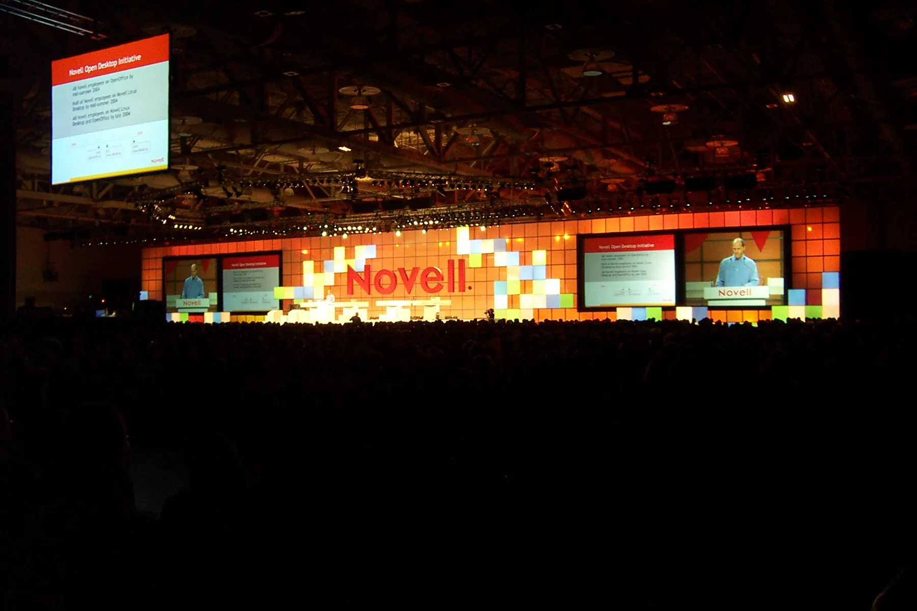 A conference main-stage presentation — the kind of deck Claude Slides now drafts and hands back as a PowerPoint file.