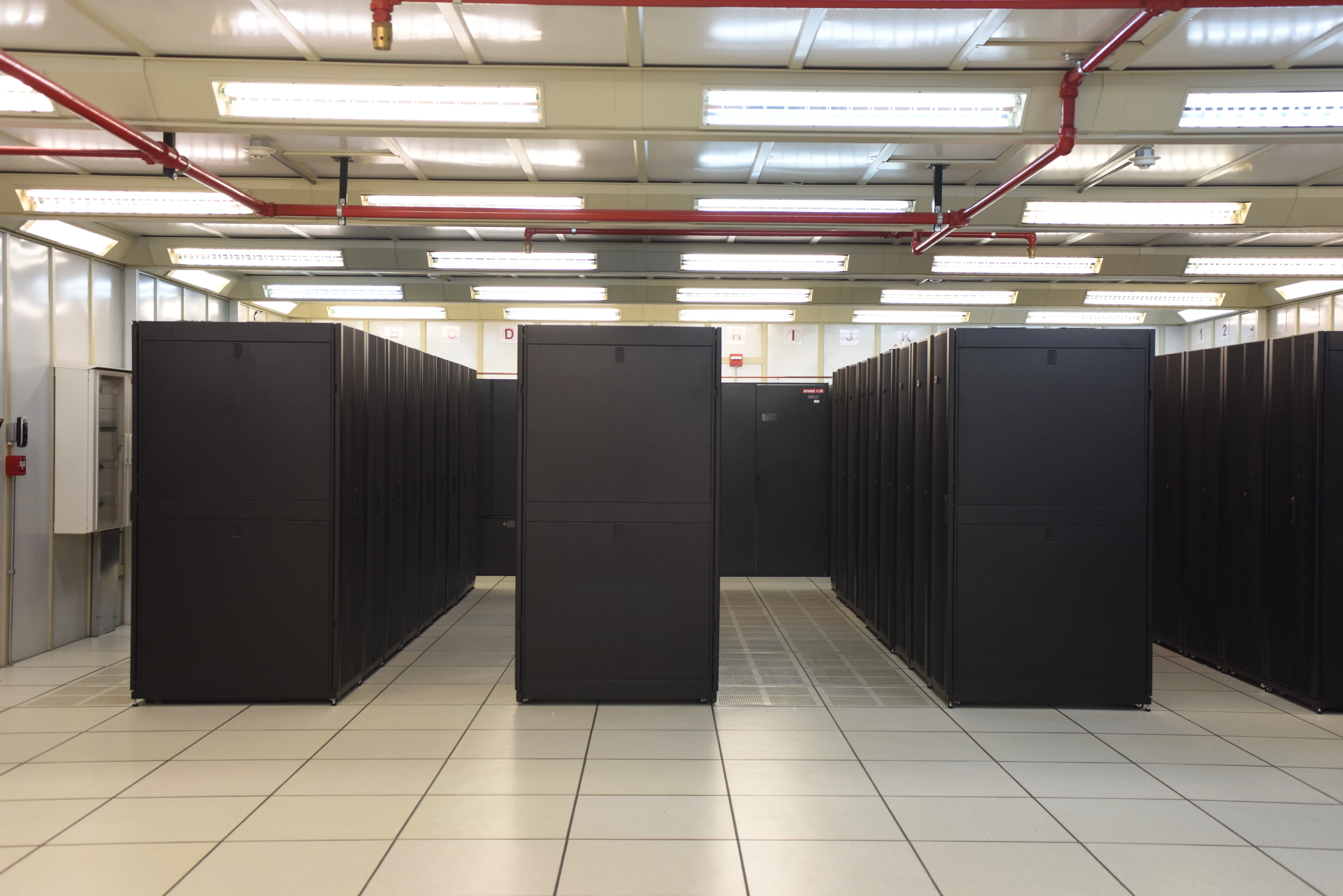 A production data center floor, the kind of read-serving infrastructure Perplexity moved off DynamoDB and onto its own CobbleDB store.